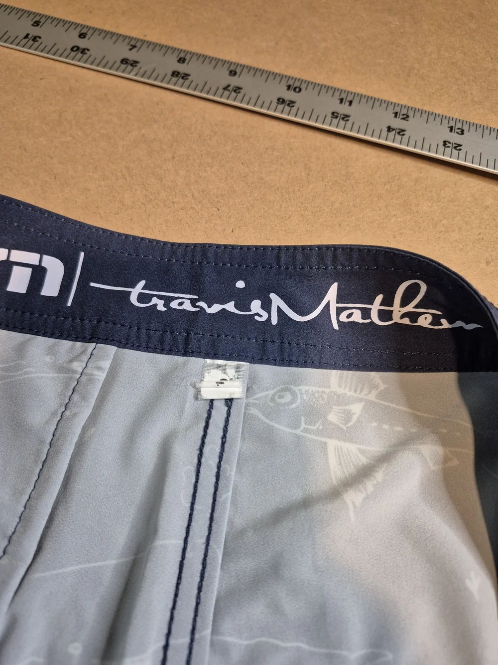Travis Mathew Navy Swim Shorts with Light Blue Whale & Fish Print 4552